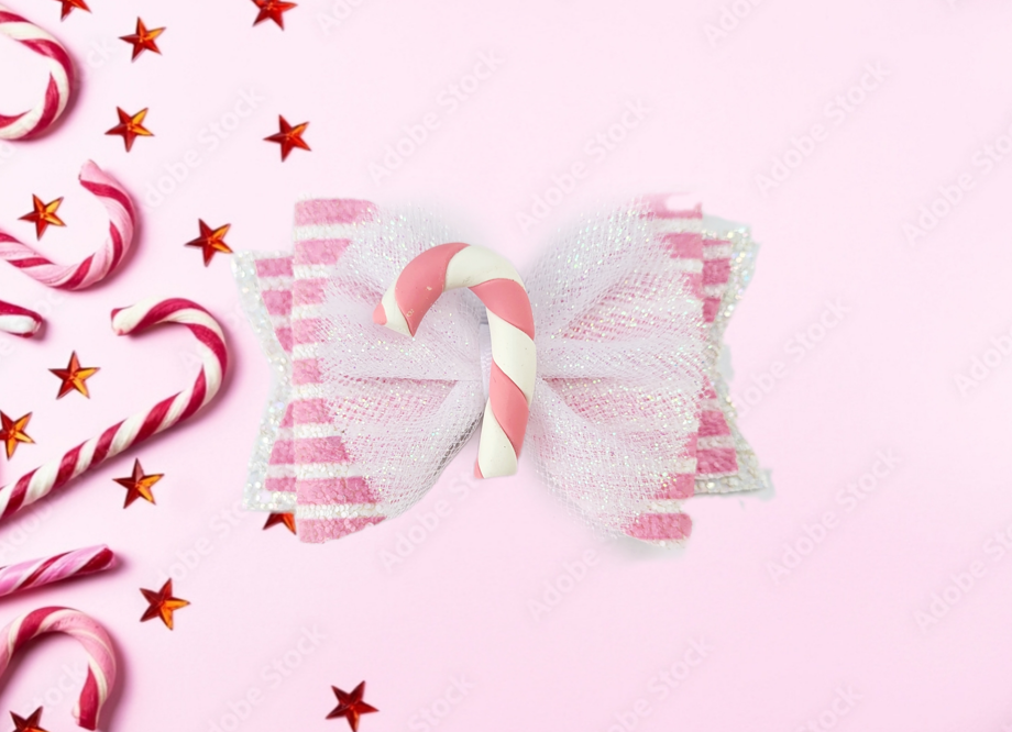 Pink candy cane bow